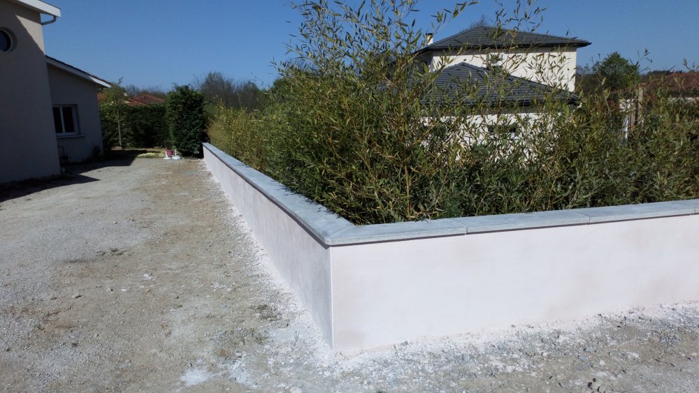 Création de muret Pose de couvertine et réalisation d'un enduit